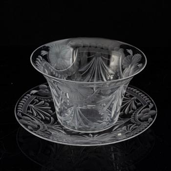 A pair of glass bowls with dishes, 20th century.