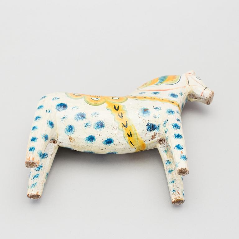 A painted folk art dala horse first half of the 20th century.