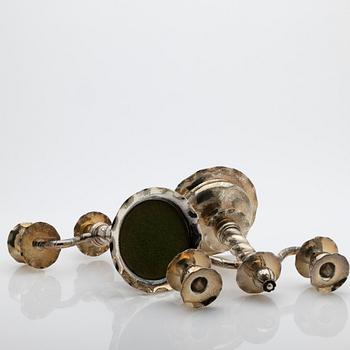 C.G. Hallberg, Pair of candelabra, silver, Stockholm, 1927.