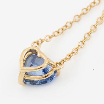 Necklace in 18K gold with a faceted heart-shaped sapphire and round brilliant-cut diamonds.