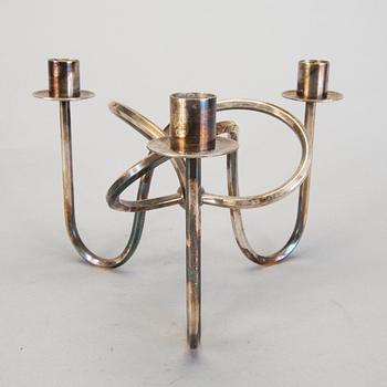 LJUSSTAKE, "Vänskapsknuten", försilvrad, Josef Frank för Svenskt Tenn, formgiven 1938.
