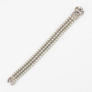 Armband 18K vitguld med odlade pärlor och runda briljantslipade diamanter.