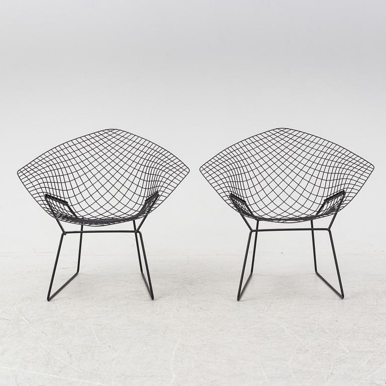 Harry Bertoia, a pair of metal lounge chairs, 1960's.