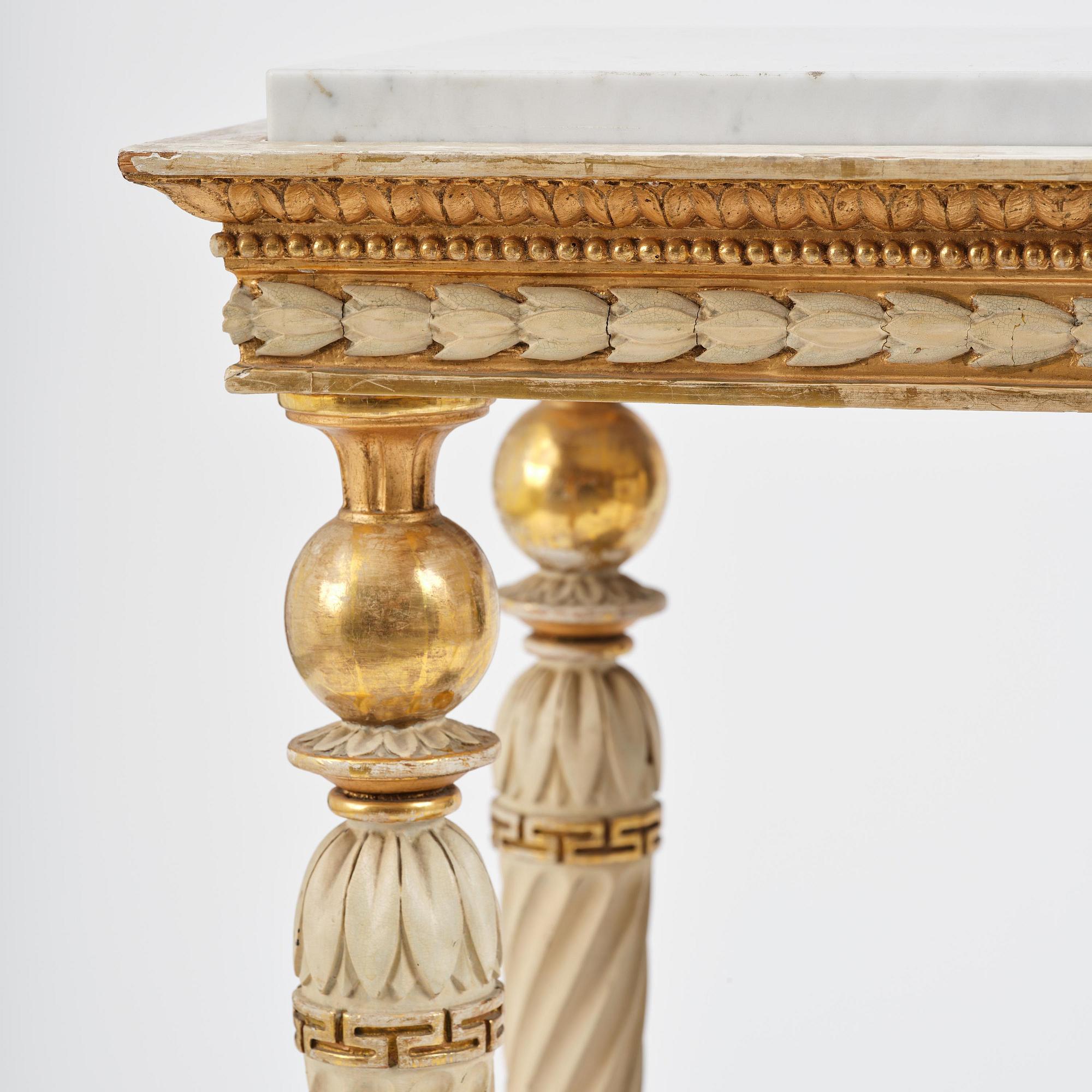 A late Gustavian giltwood console table attributed to Hedberg & Lindblad (active in Stockholm 1802-05).