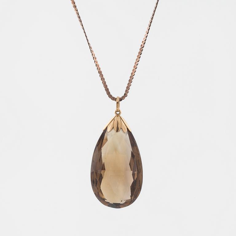 A briolette cut smoky quartz pendant by GVH, Stockholm, 1936.