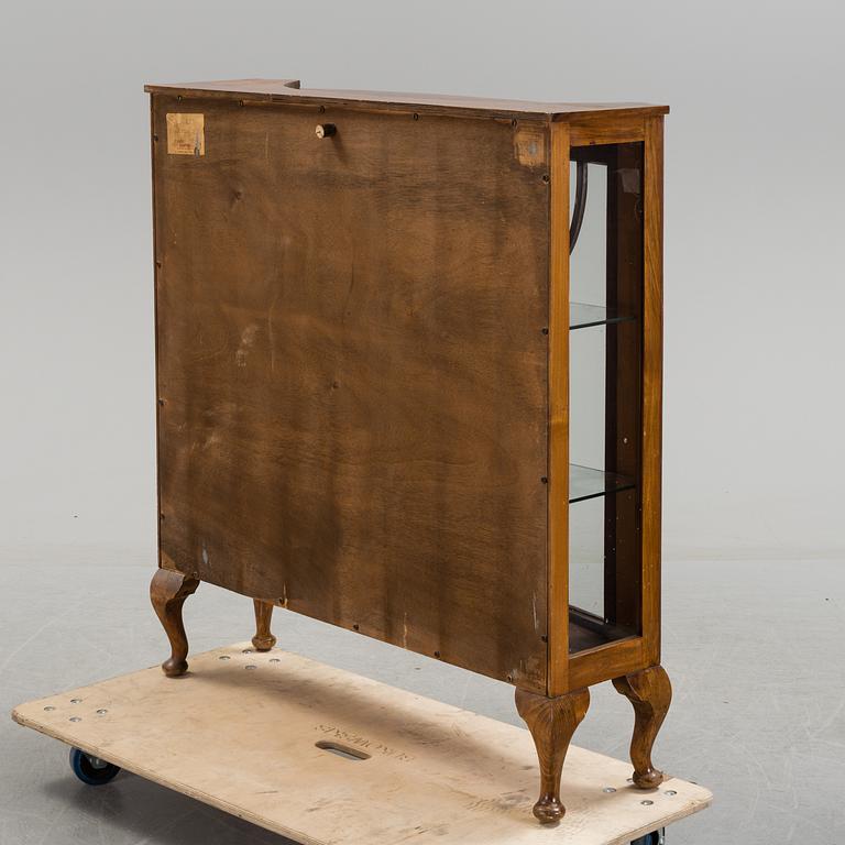 A 20th century English typ cabinet.