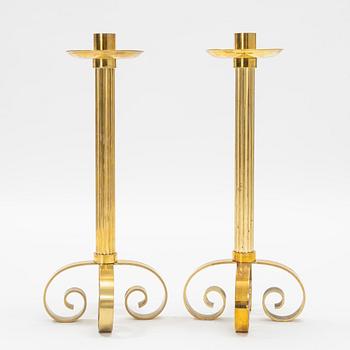 Ivar Ålenius-Björk, a pair of brass candle holders, Ystad Metall.