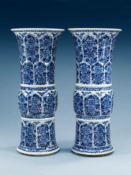 A pair of large blue and white Gu shaped vases, Qing dynasty, Kangxi (1662-1722). (2).