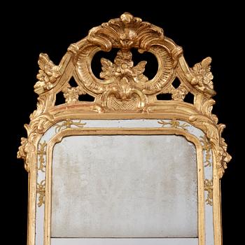 A Swedish Rococo 18th century mirror, dated 1769.