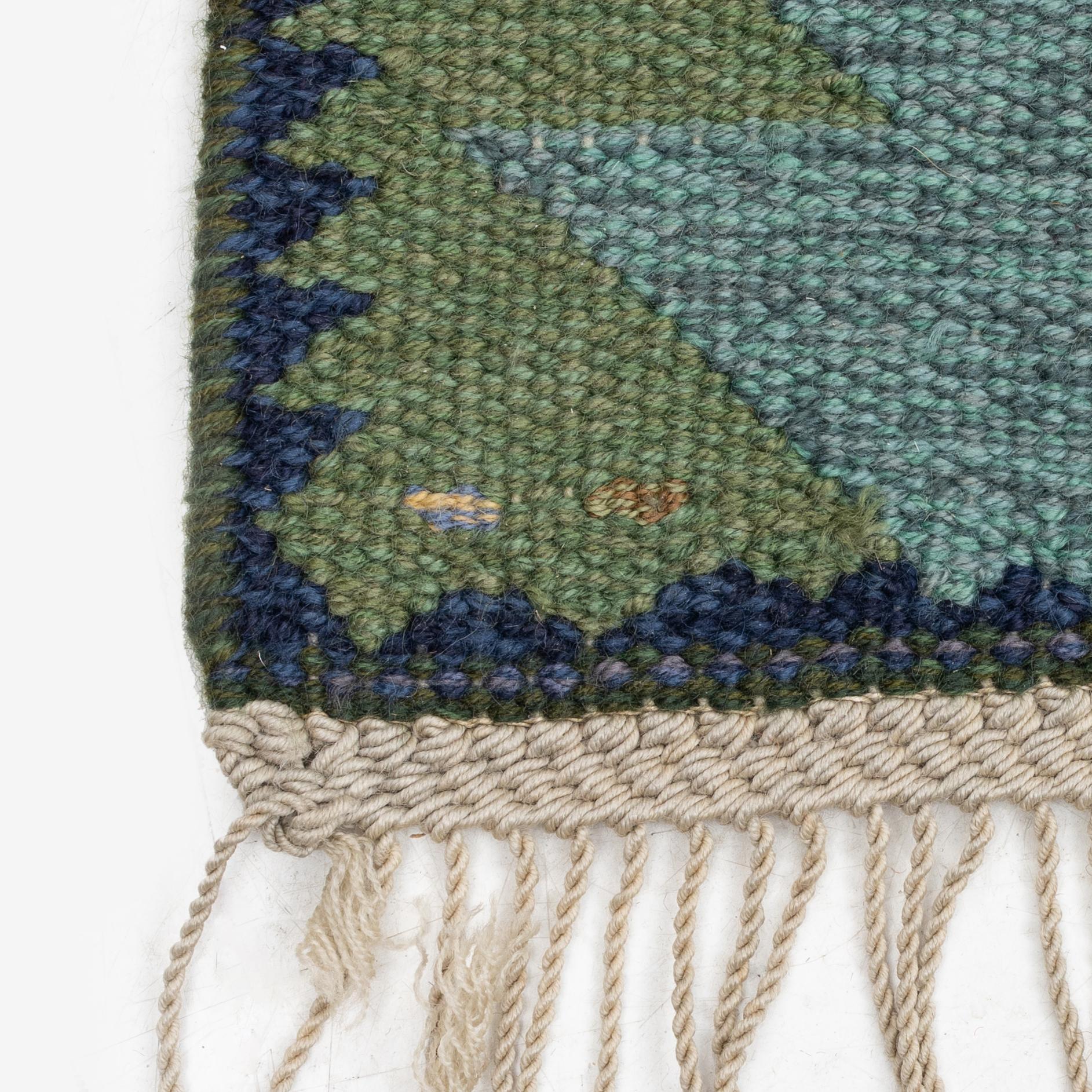 Barbro Nilsson, a 'Tånga blå',  tapestry weave carpet, c. 345 x 277 cm, signed AB MMF BN.