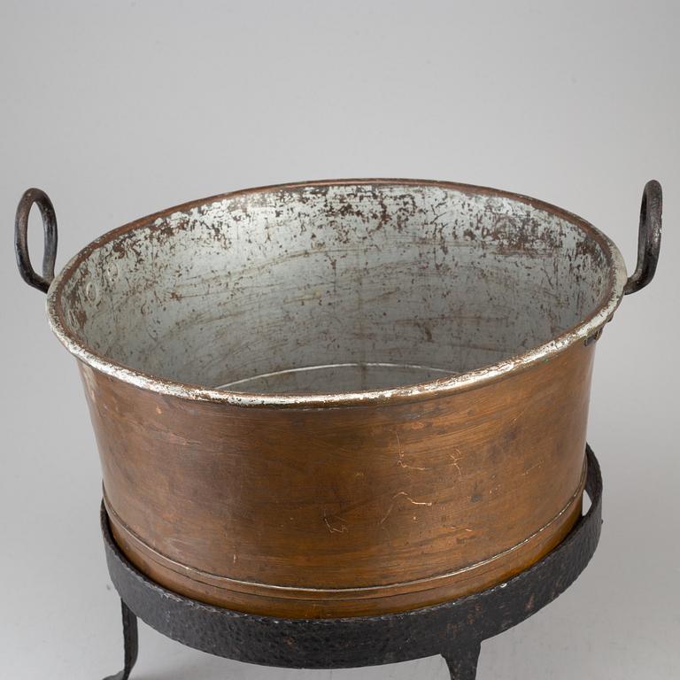 A 19th century copper cauldron.