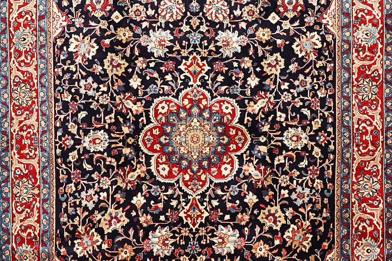 A carpet, Mashad, c. 386 x 259 cm.