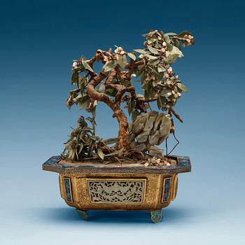 1371. A cloisonné, nephrite, crystal and coral potted garden, Qing dynasty.