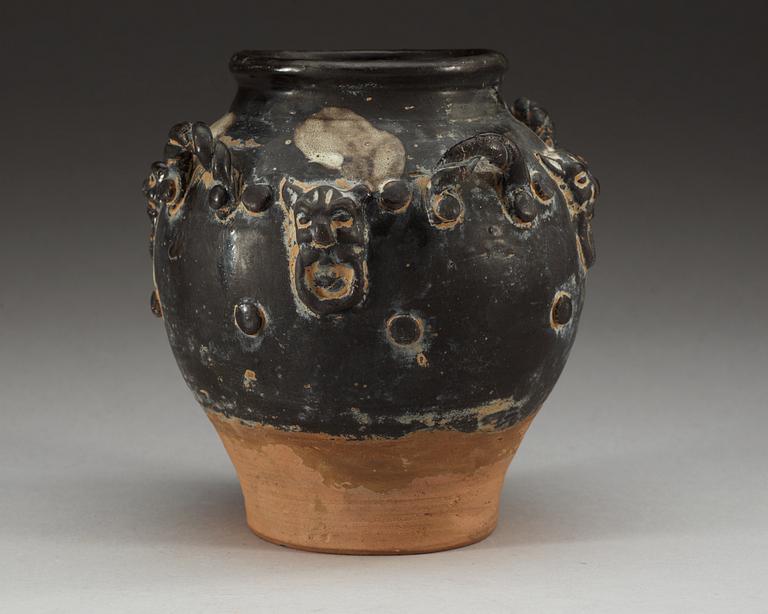 A black glazed jar, Tang dynasty (618-907).