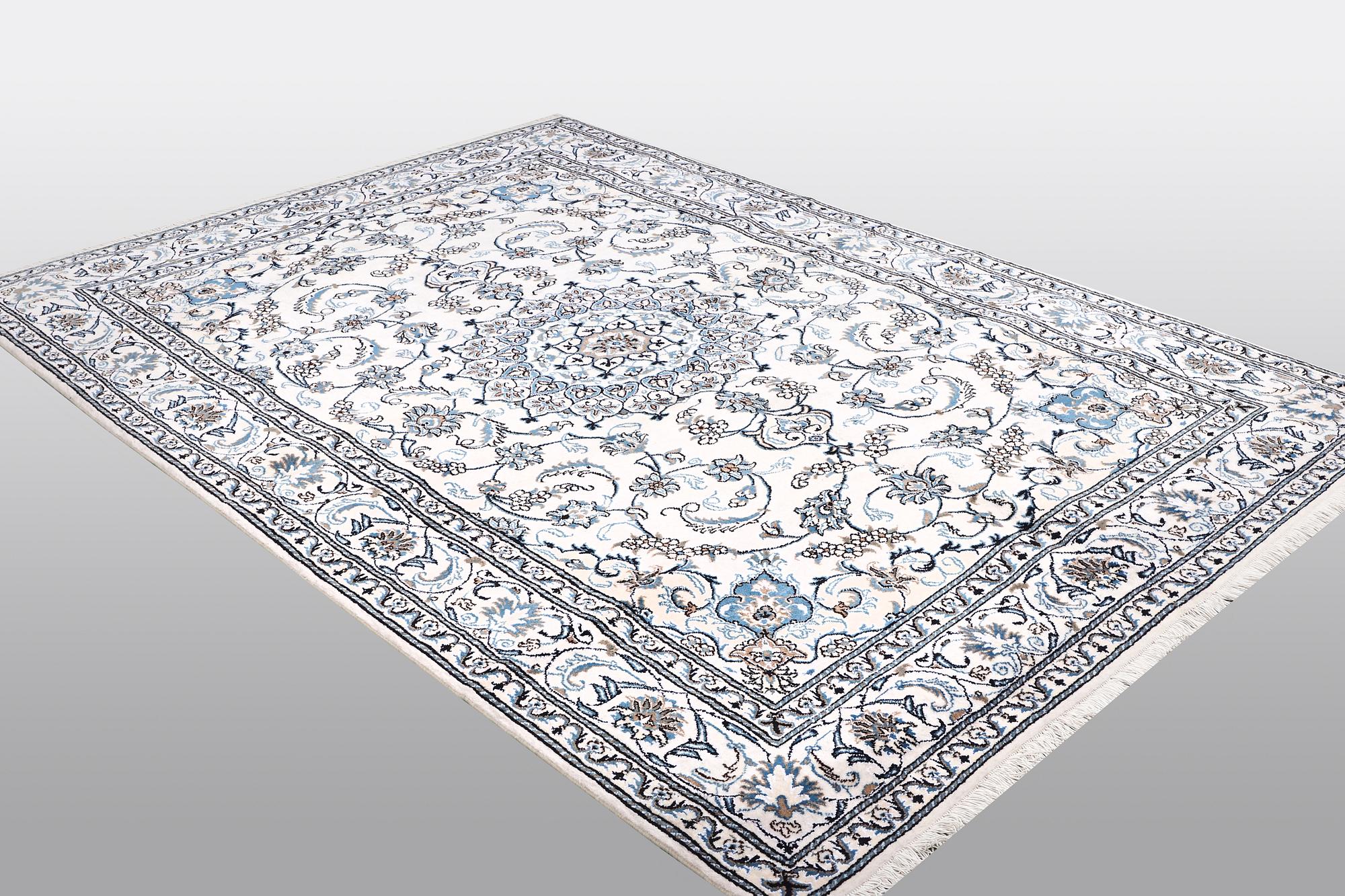 A carpet, Nain, 285 x 196 cm.