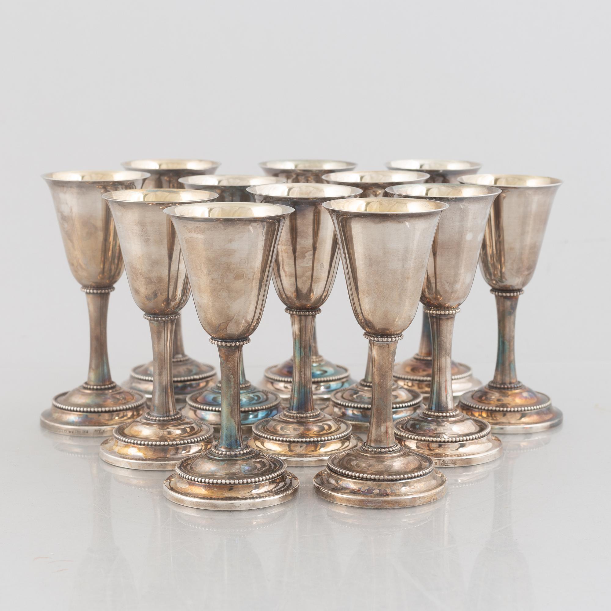 Karl-Axel Karlsson Silversmed, twelve sterling silver cups, Stockholm 1975-85.