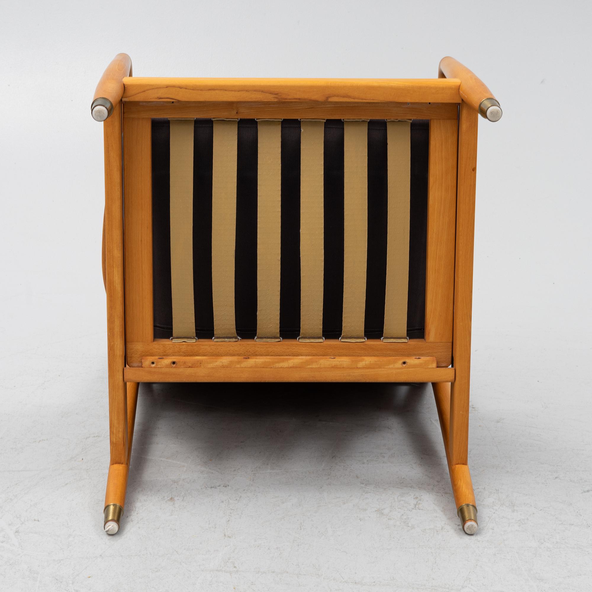 Folke Ohlsson, a beech 'USA-143' armchair, designed in 1953.