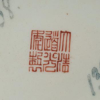 An enamelled coral-gorund dish, Qing dynasty with Daoguangs seal mark and period (1821-1850).
