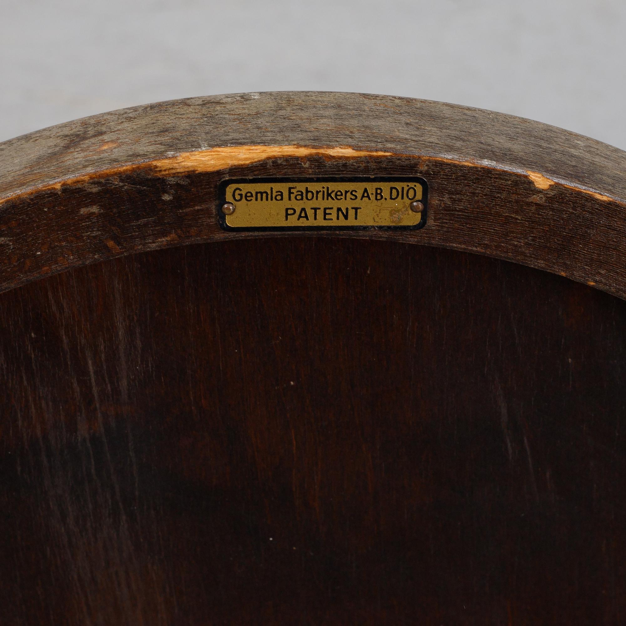 A model 5560 'Stackmo' collapsible stained beech chair, Gemla, Diö, 1930's.