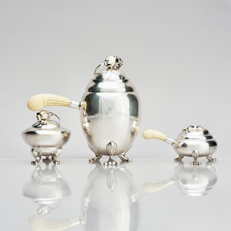 Georg Jensen, a three pieces coffee service in sterling silver, "Magnolia/Blossom", Copenhagen 1933-44.