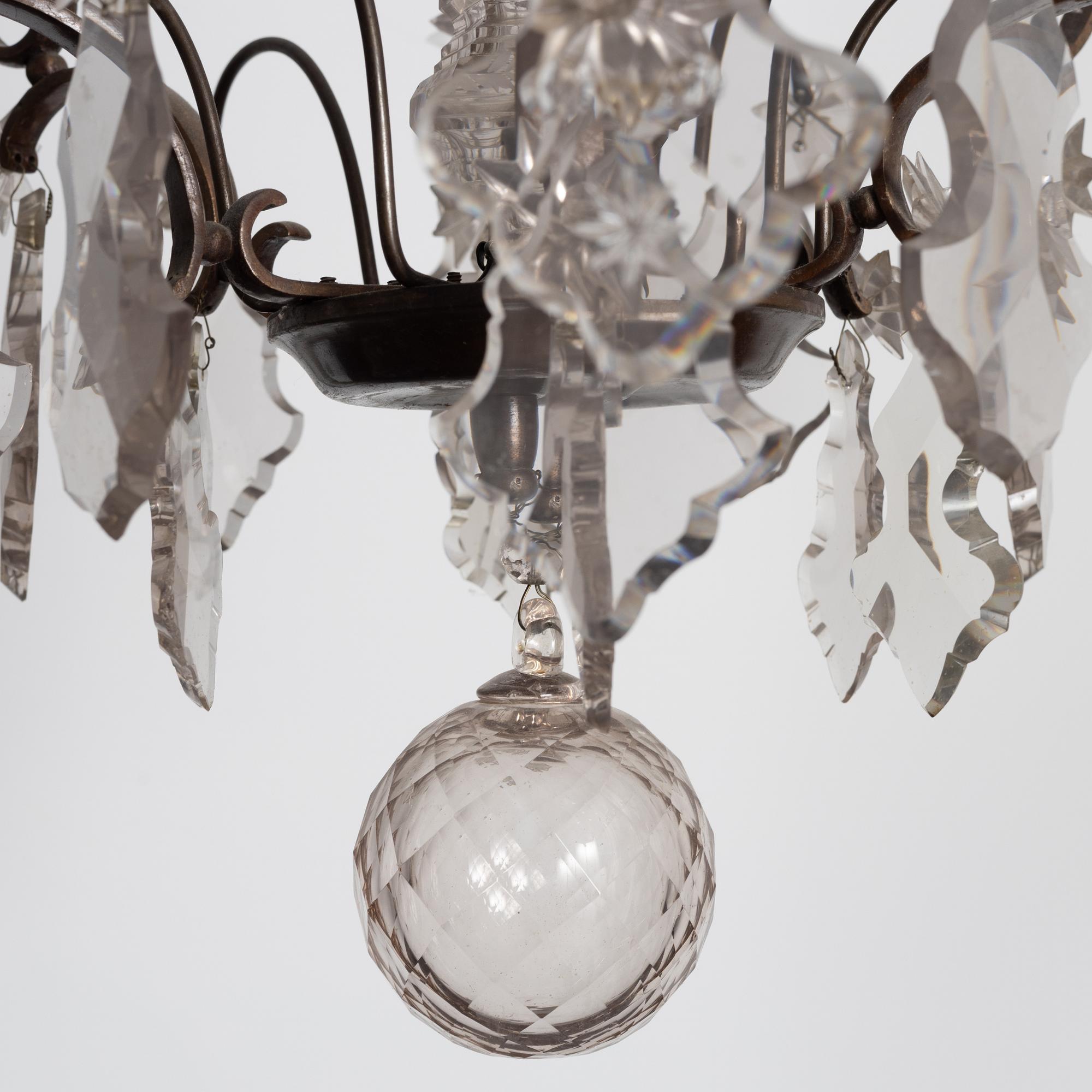 A Rococo style chandelier, early 20th century.
