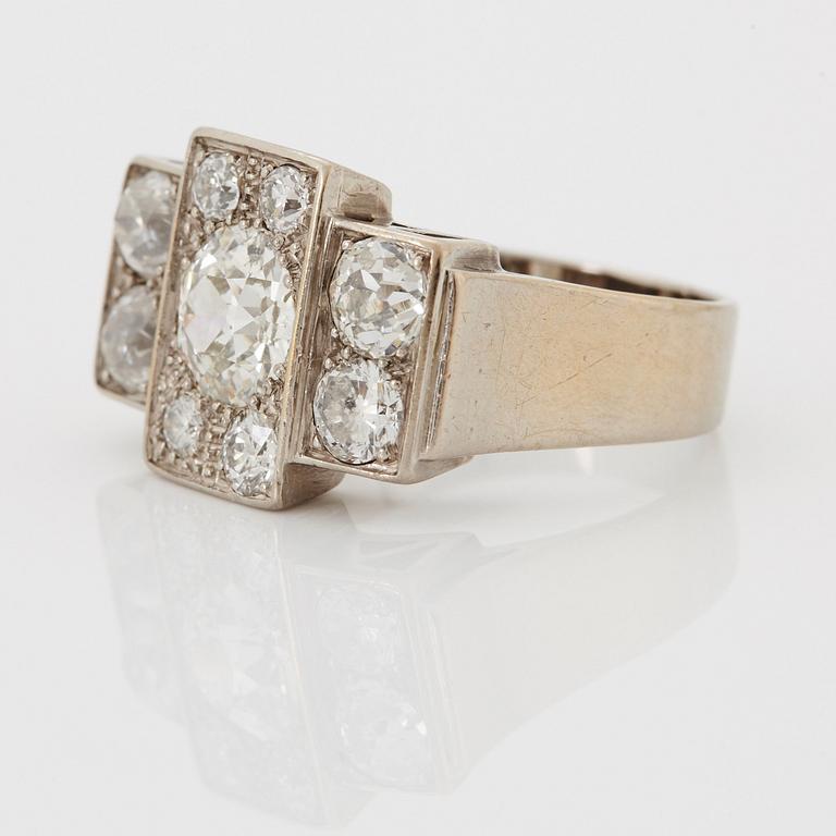 An 18K white gold ring set with old-cut diamonds.