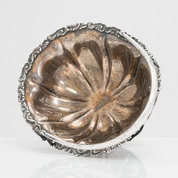 A sweetmeat basket and a 12-piece set of silver coasters, Helsinki and Hämeenlinna, 1920s and 1930s.