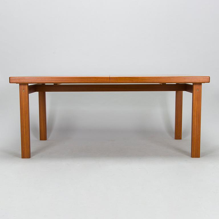 A mid-20th century dining table.
