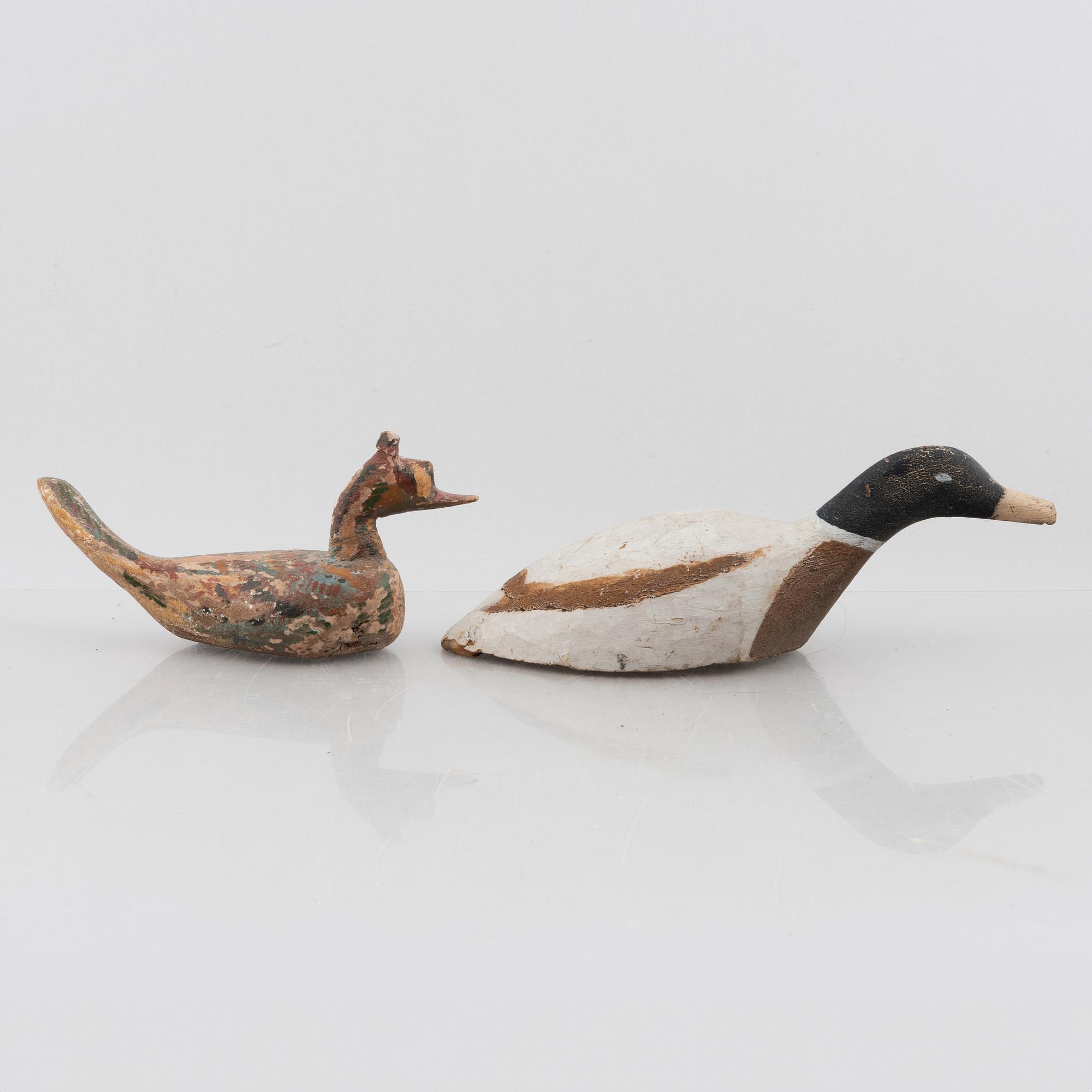 A set of six wooden duck decoys, 20th century.