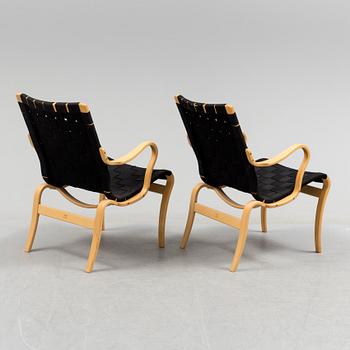 a pair of "Mina" armchairs by Bruno Matsson.