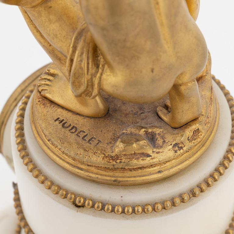 A Louis XVI-style marble and ormolu mantel clock, late 19th Century.