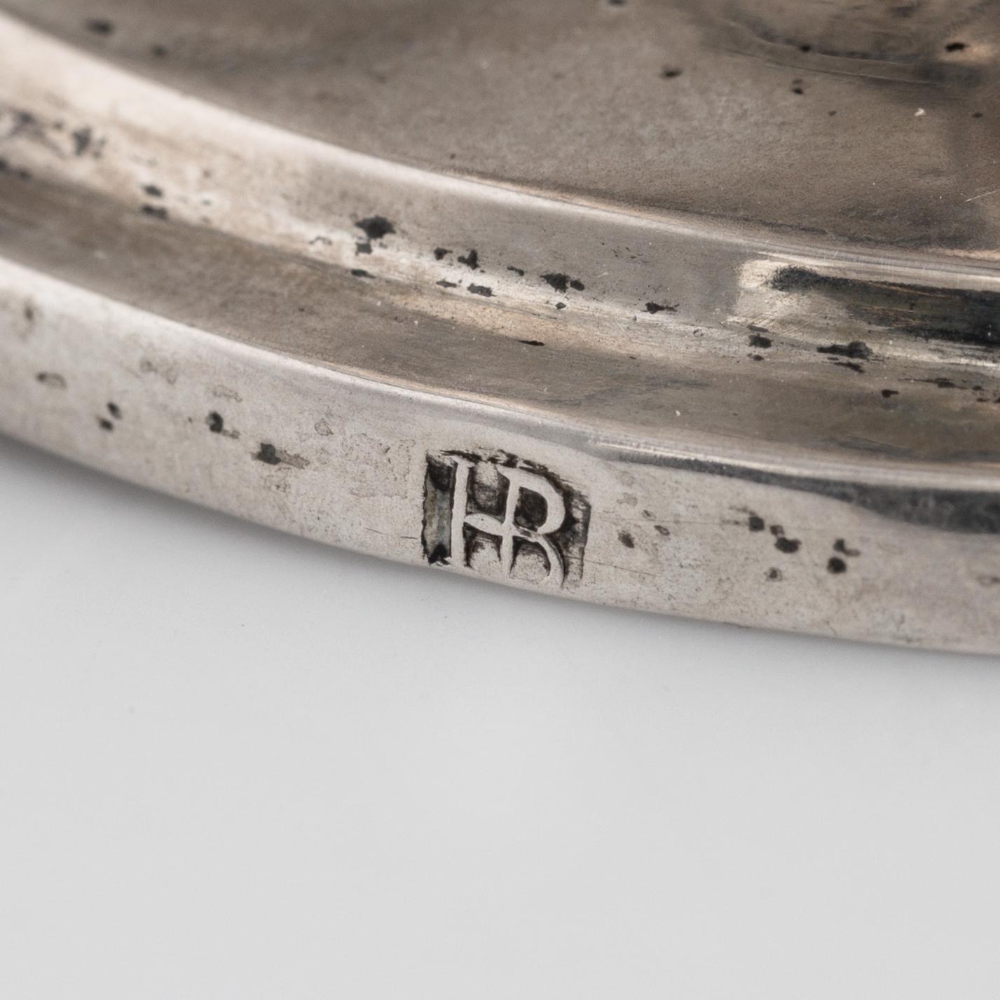 A pair of firt half of the 19th century parcel-gilt silver salt-cellars by an uknown master, one marked HB.