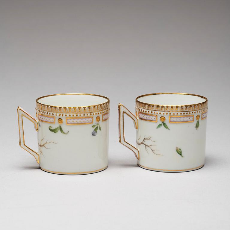 A pair of Royal Copenhagen "Flora Danica" coffee cups with stands, Denmark, 20th Century.