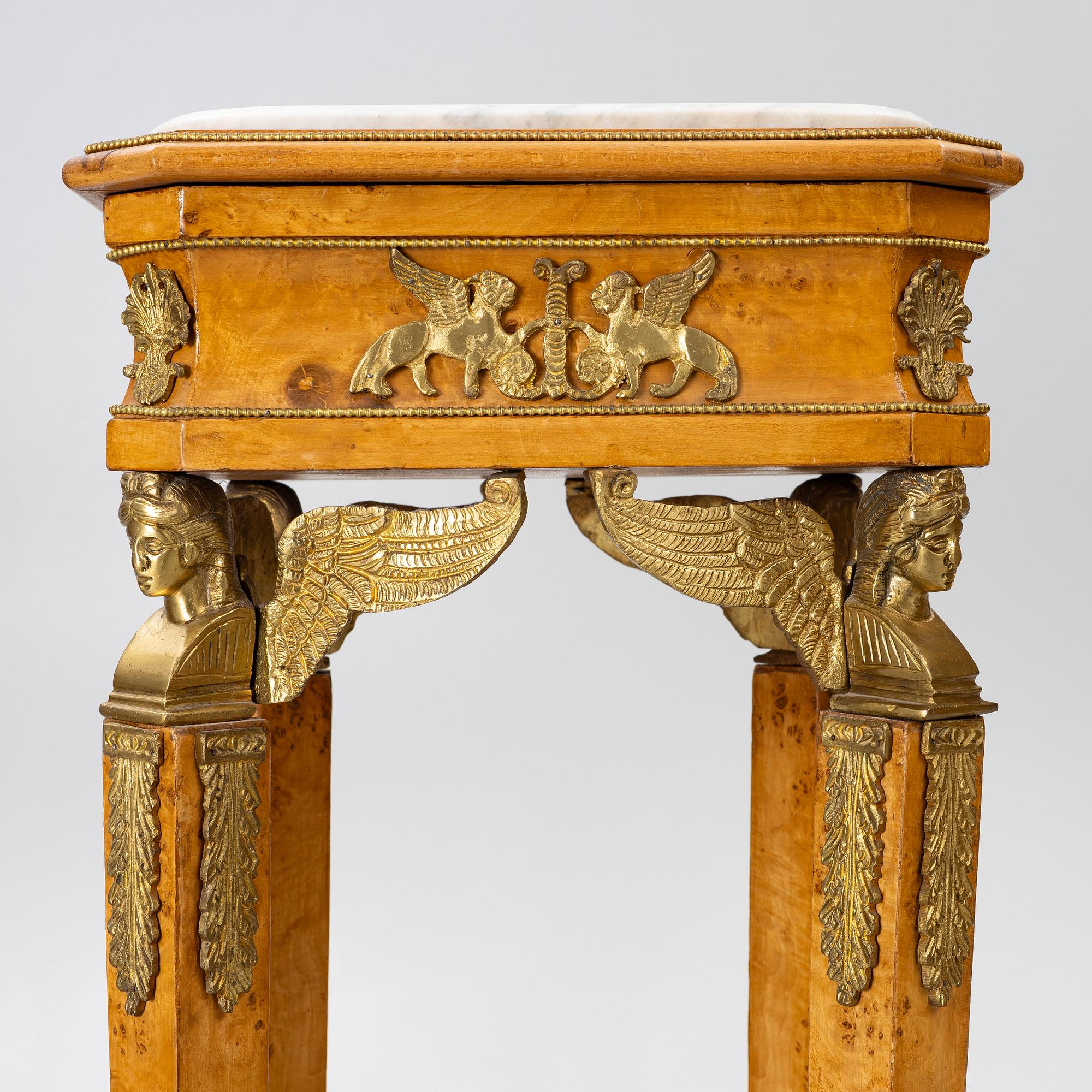 Pedestals, a pair, Empire style, around the year 2000.