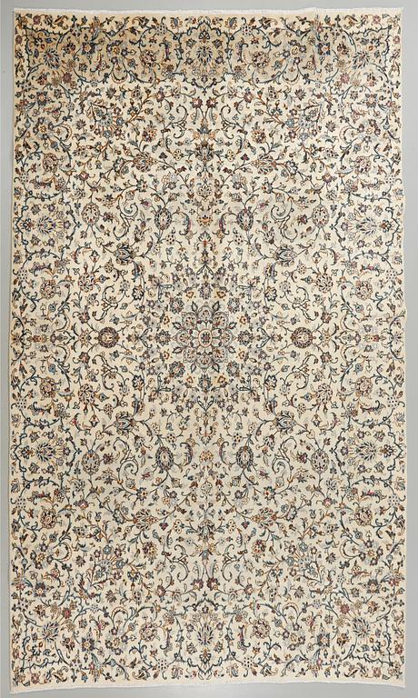 A Keshan rug, 396 x 290 cm.