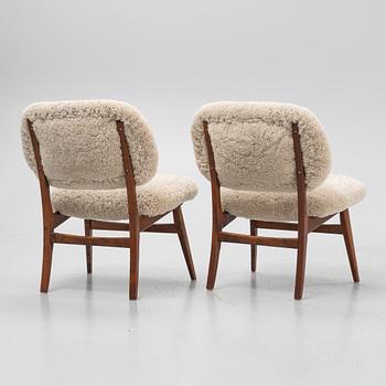 A pair of mid 20th century lounge chairs.