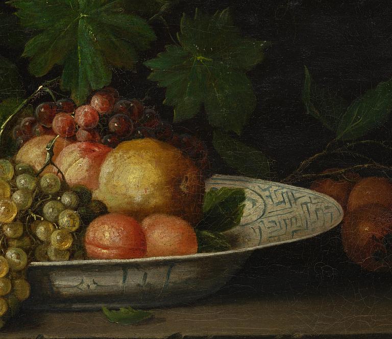 Joris van Son, follower of, Still life with a goldfinch, fruits, and a plate.