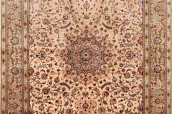 A carpet, Tabriz, with silk warp, c. 297 x 197 cm.