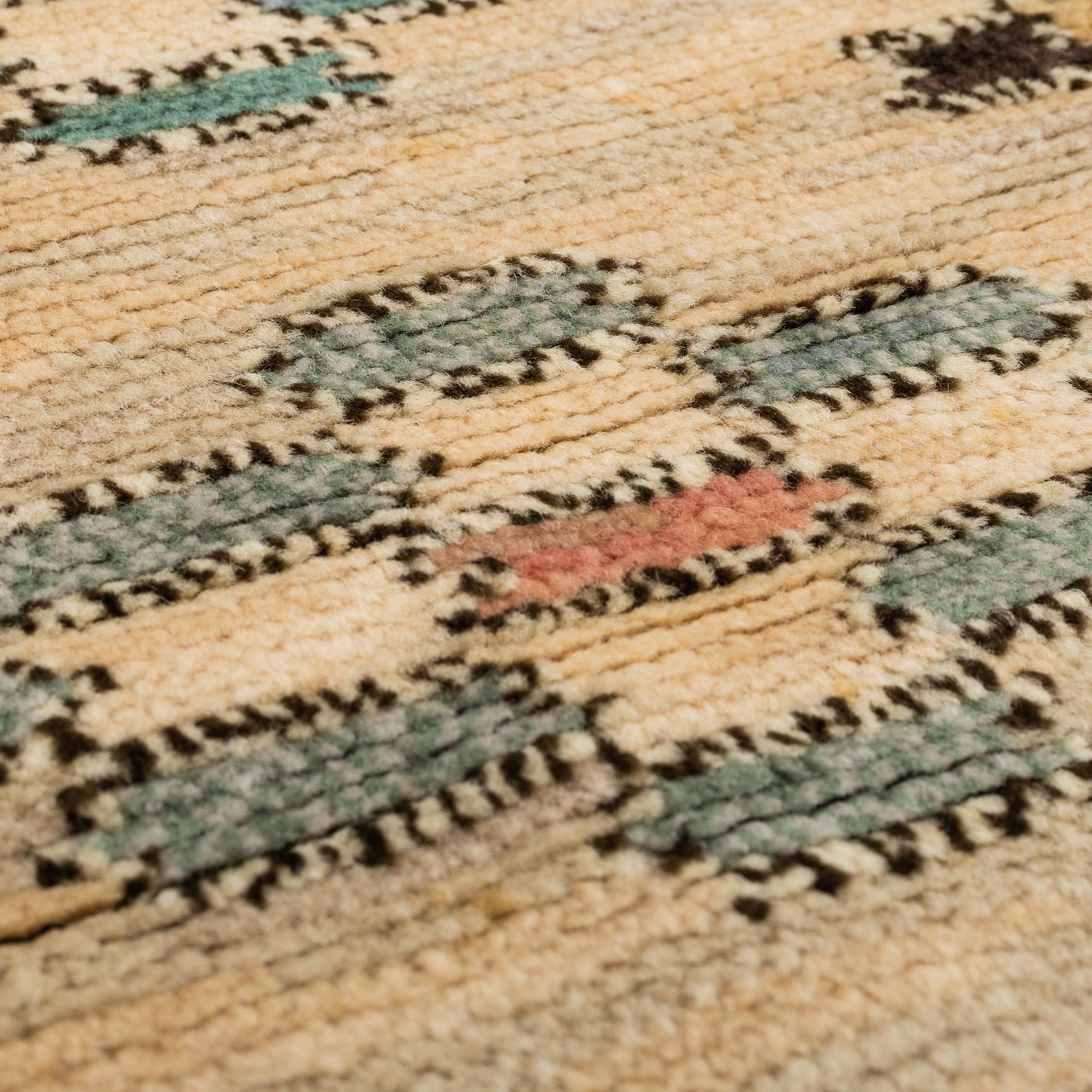 A CARPET, "Skissmattan", knotted pile, ca 159,5 x 101,5 cm, signed MMF.