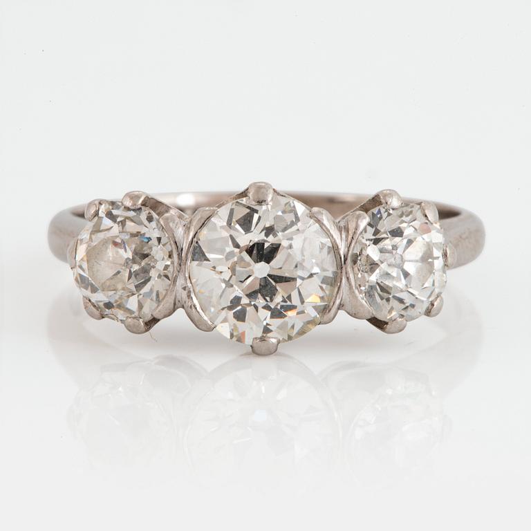 An 18K white gold ring set with old-cut diamonds.