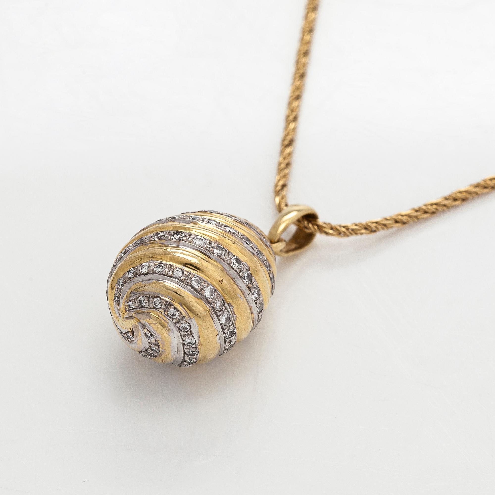 Cartier, a "Pendentif Oeuf"  diamond pendant and chain, 18K gold.