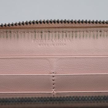 BOTTEGA VENETA, a intrecciato leather wallet.