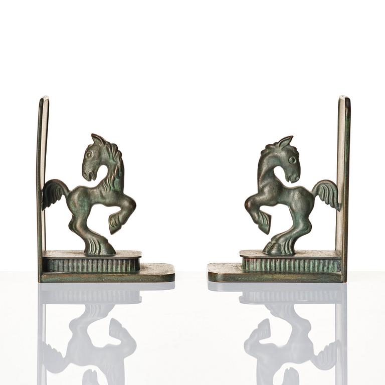 Carl-Einar Borgström, a pair of patinated bronze bookends, Ystad Brons, 1930-40s.