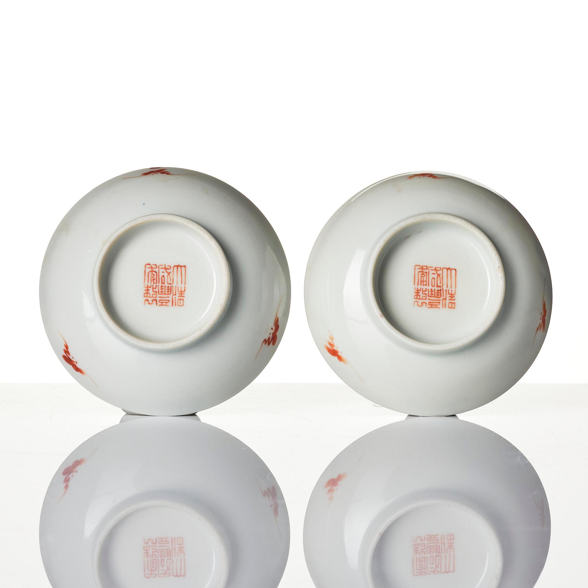 A pair of enamelled landscape dishes, Qing dynasty, seal mark in red Xianfeng (1909-11) and of the period.