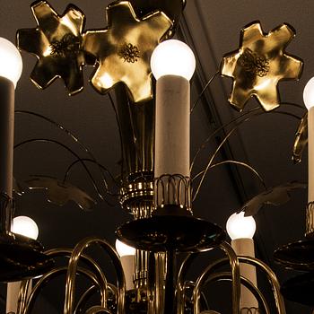 PAAVO TYNELL, A TWENTY-LIGHT CHANDELIER. Manufactured for the old church in Lahti. Taito Oy. 1940s/50s.
