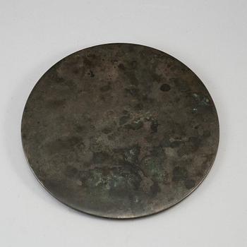 A large bronze mirror, Ming dynasty or earlier.