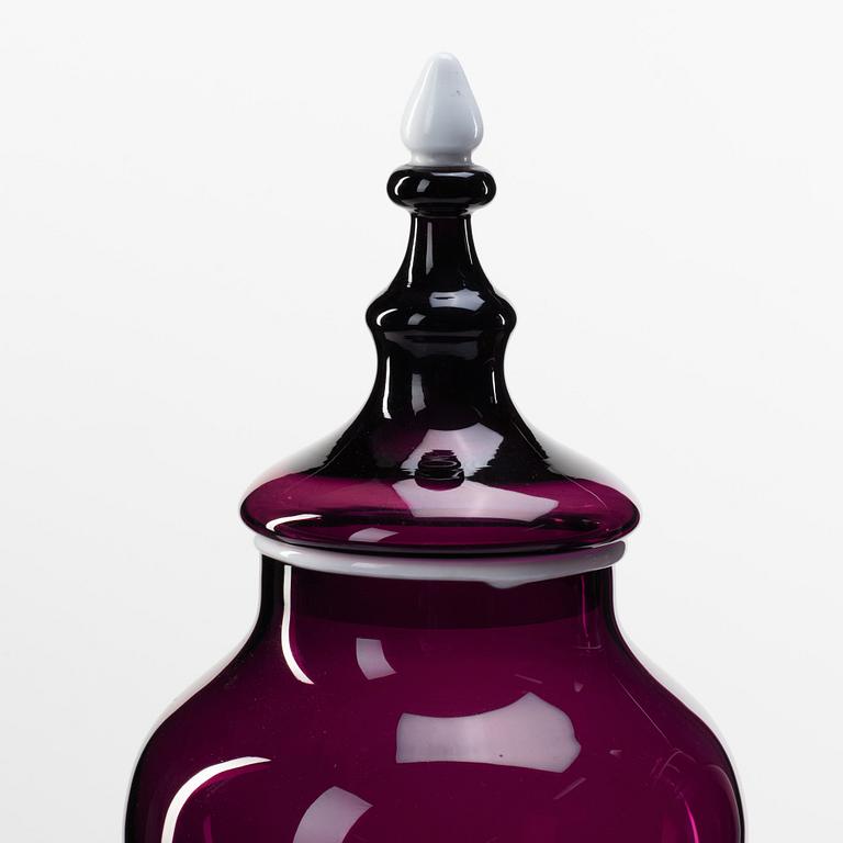 A pair of purple glass jars with covers, presumably Norway, 19th Century.