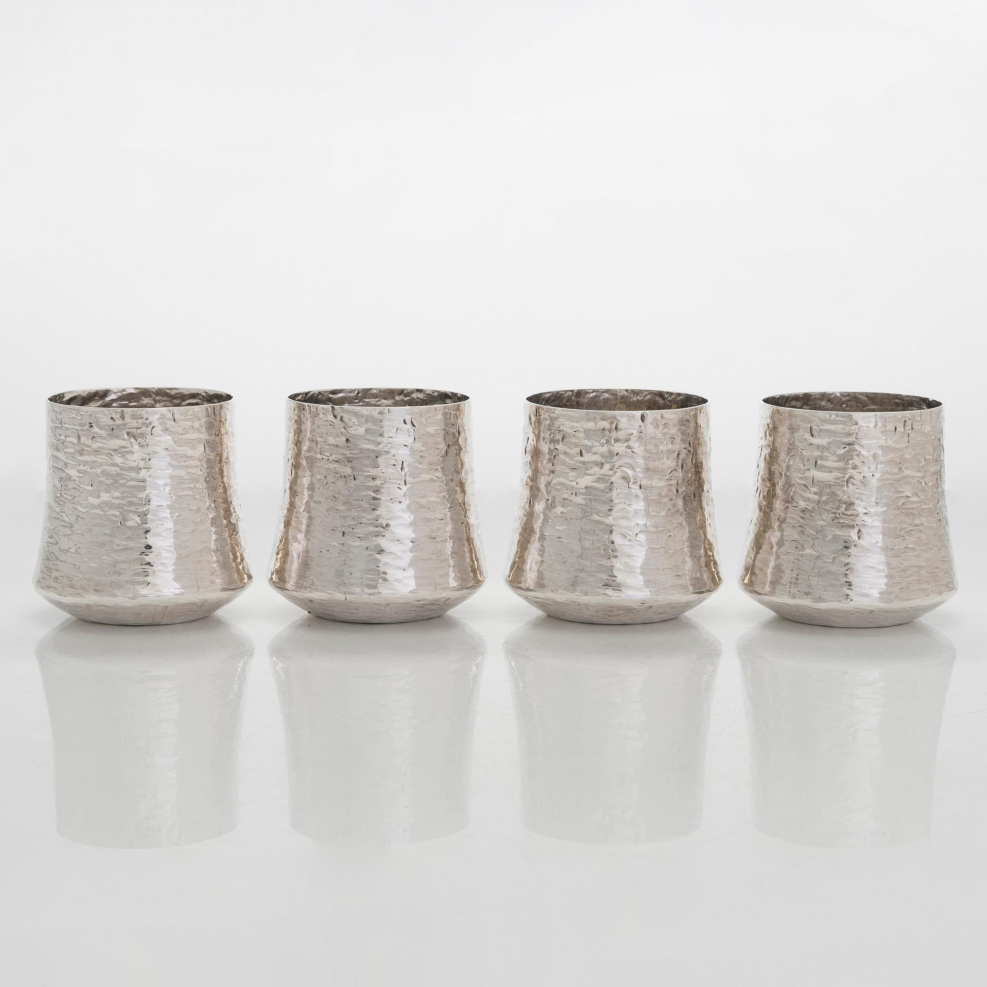 Tapio Wirkkala, four silver beakers, and a rosewood and sterling silver tray, Kultakeskus, Hämeenlinna 1973-74.