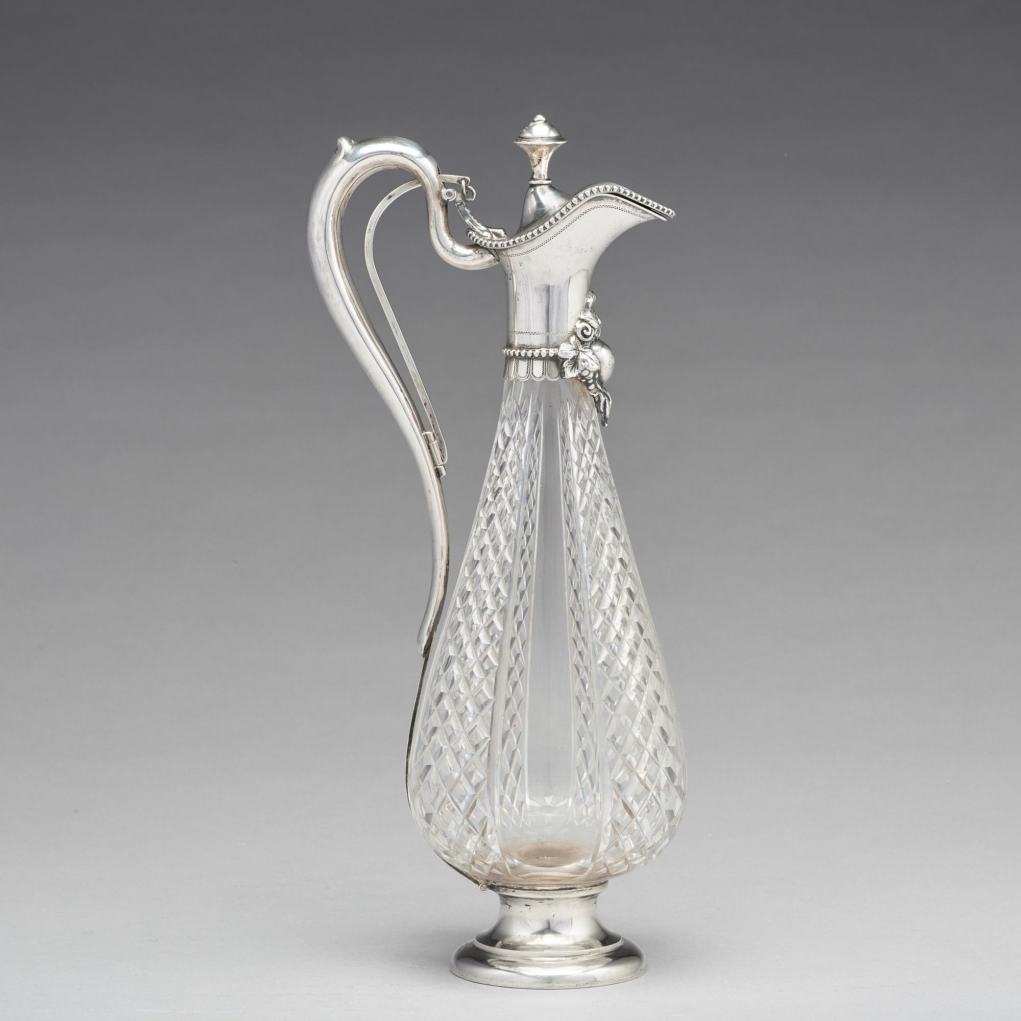 A Swedish 19th century parcel-gilt silver and glass wine-jug, mark of Lars Larsson & Co, Stockholm 1872.