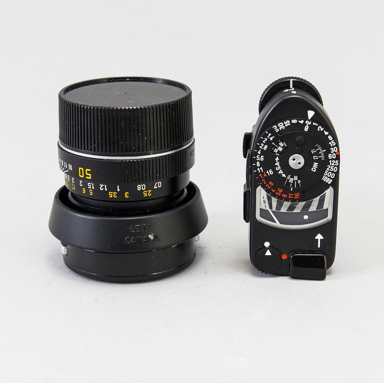 a black body Leica M4-P camera with no 1605951 made by Leitz Canada in 1982. With two lenses and a Leica Meter.